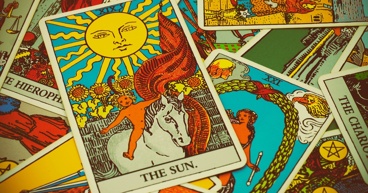The Sun Lucky Tarot Card With Other Cards On The Table