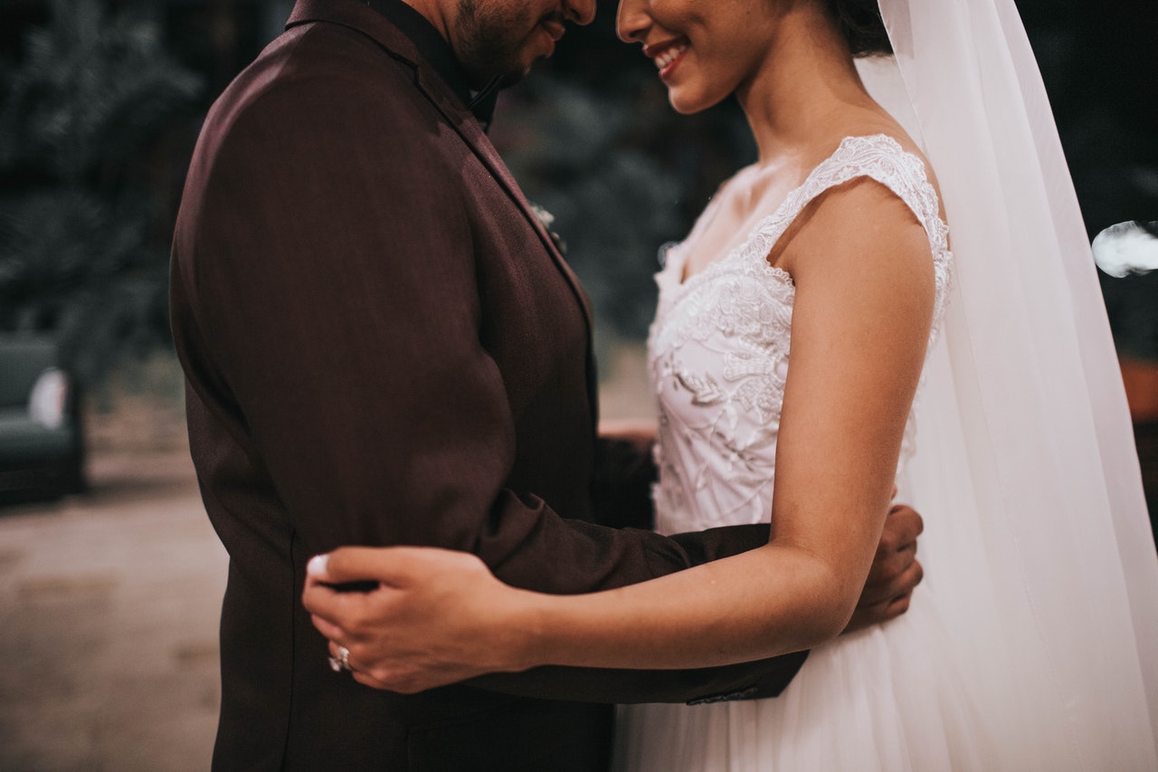 Couple Standing and Hugging during their wedding