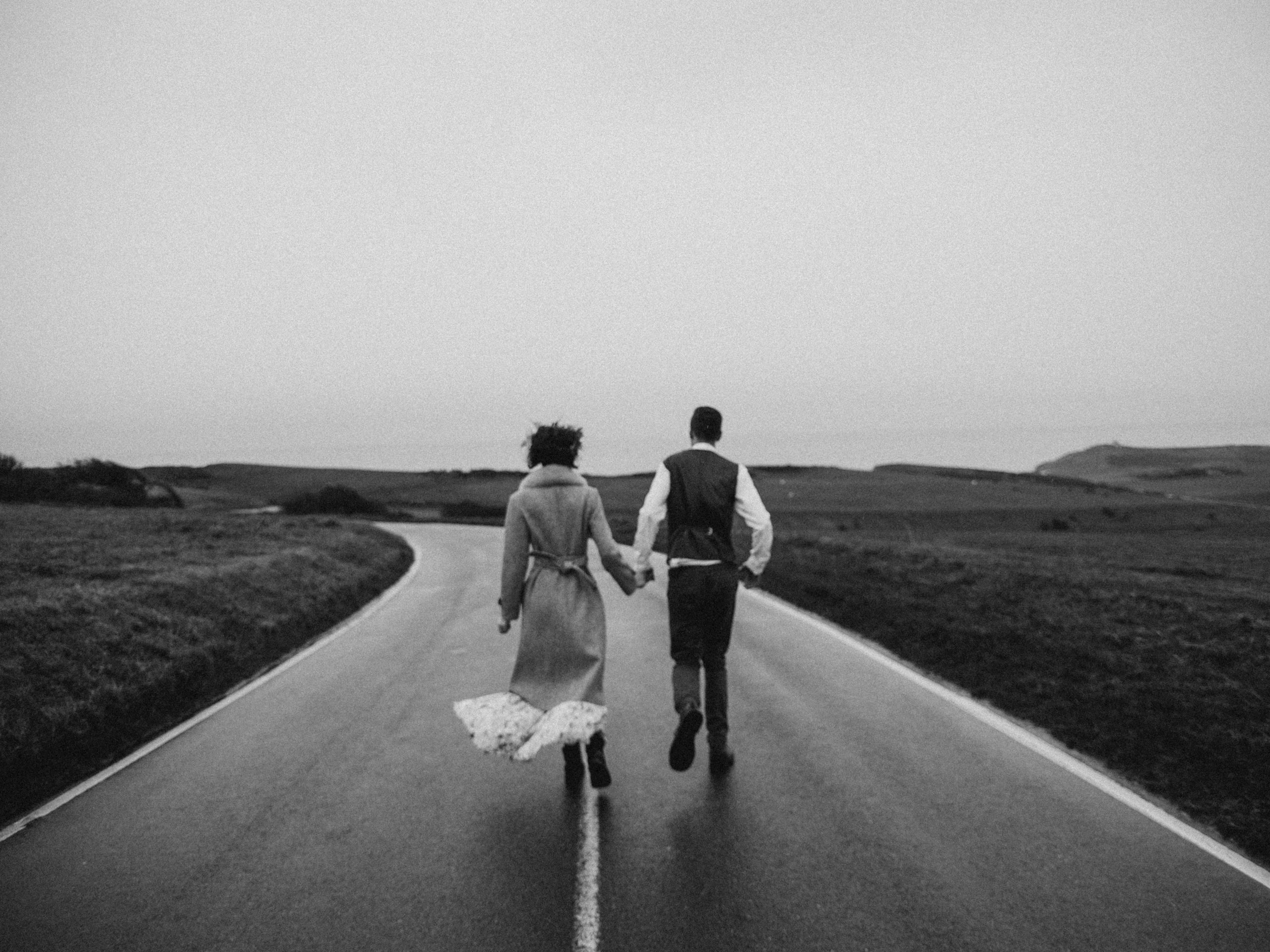 A couple walking on the road