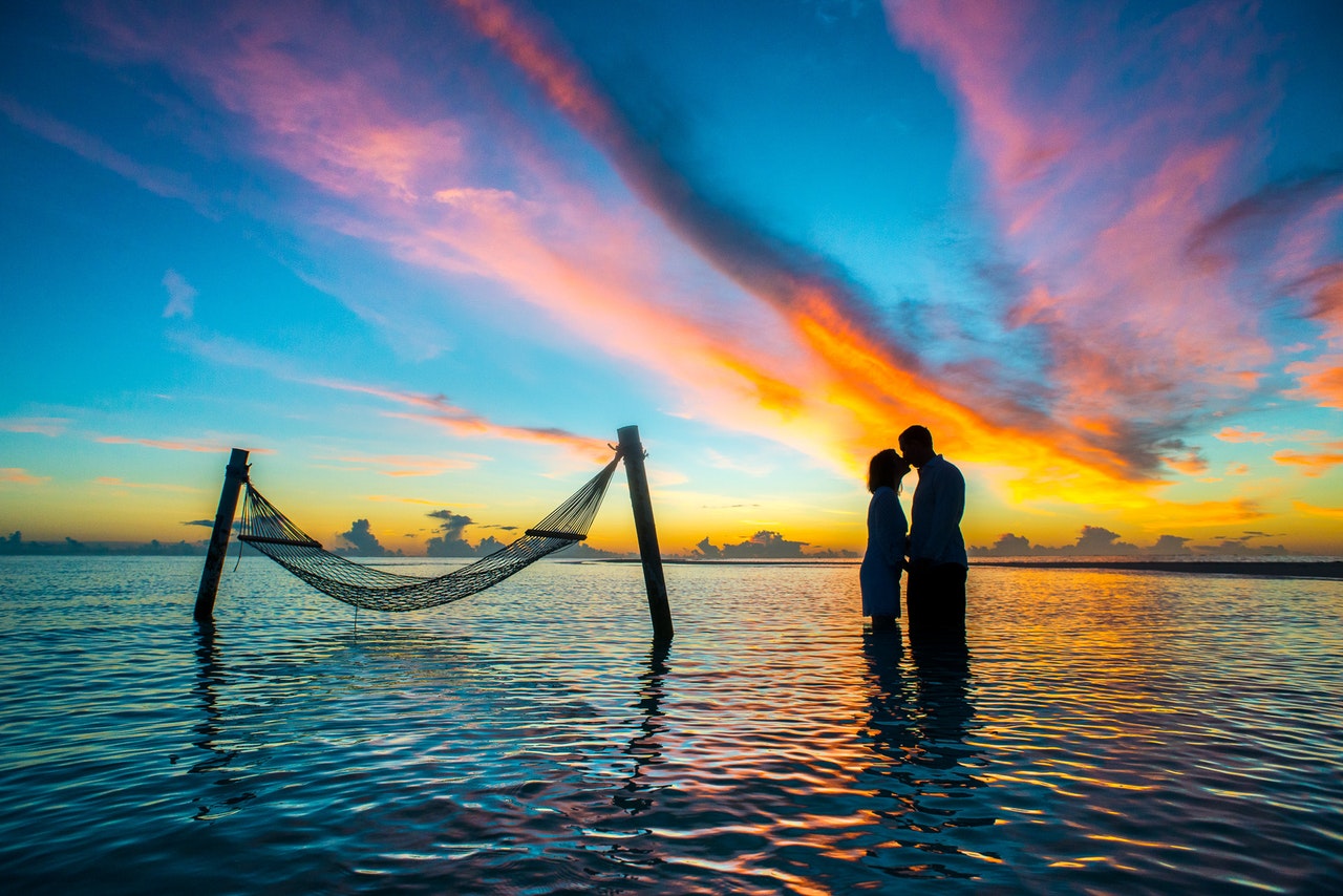 Couple Kissing Each Other during Sunset