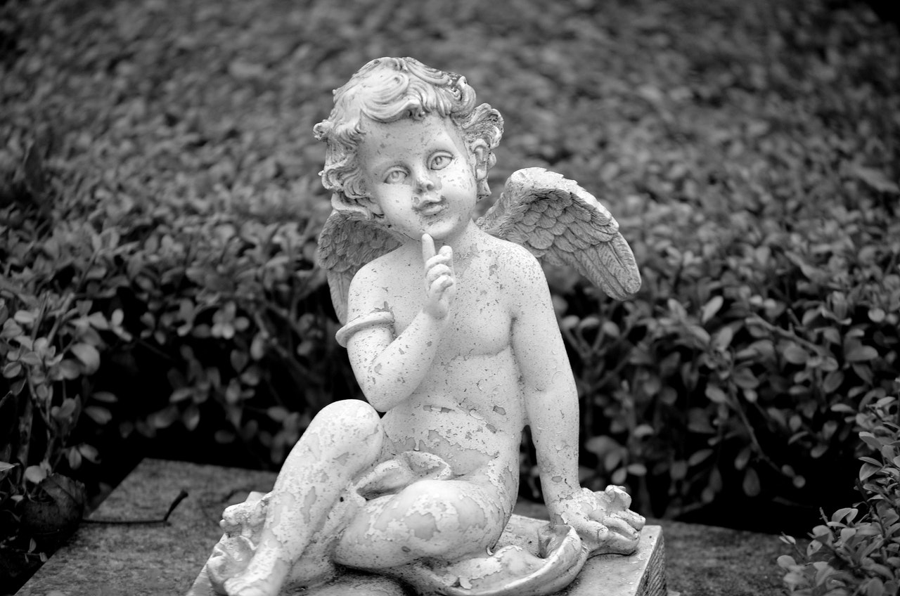 Angel statue in grayscale