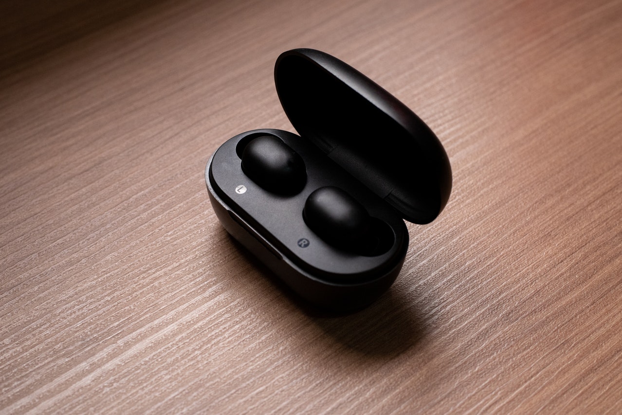 A Close-Up Shot of Black Earbuds