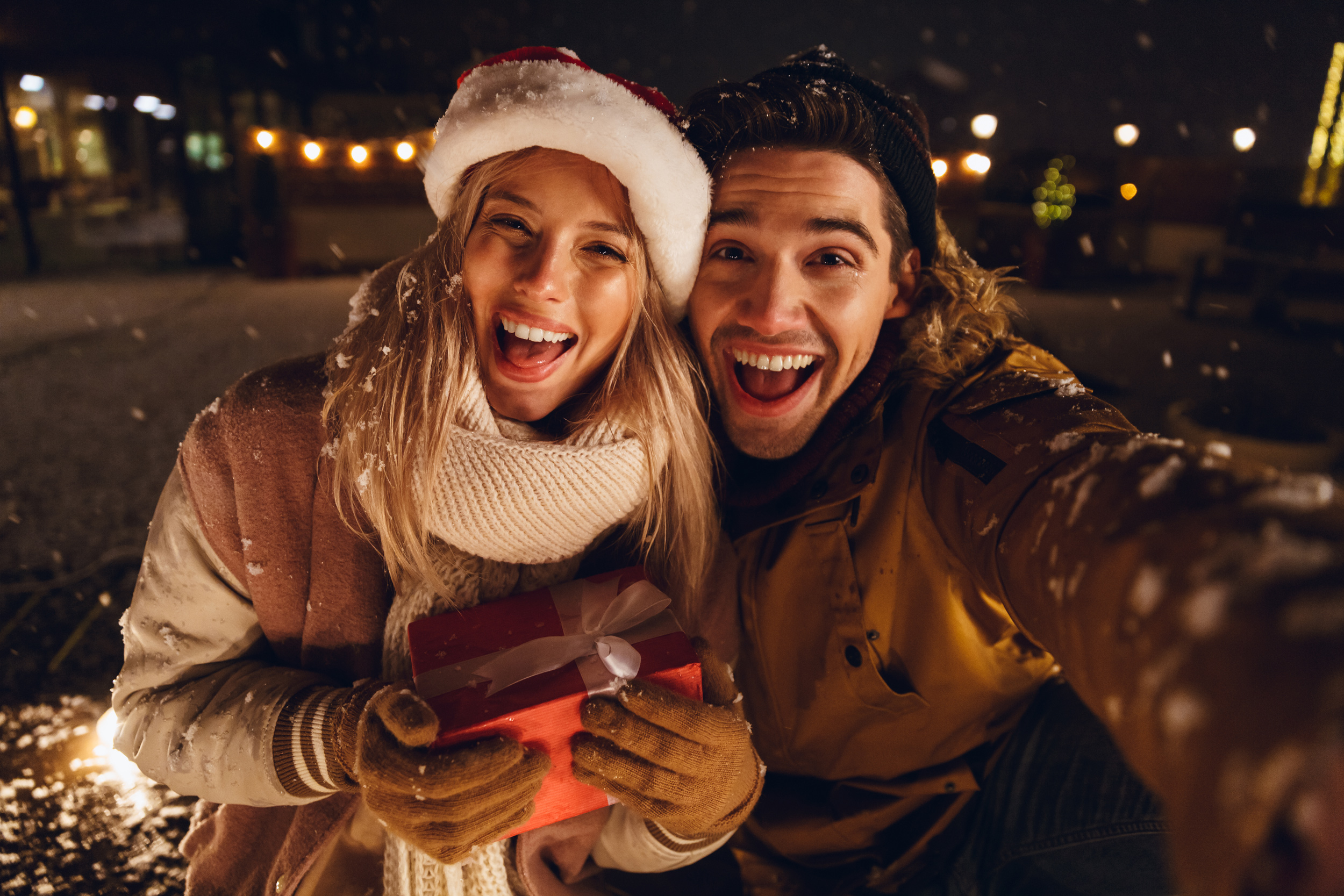 Couple taking selfie while smiling