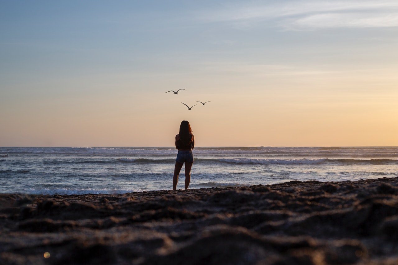Woman Gazing At The Ocean View.jpg