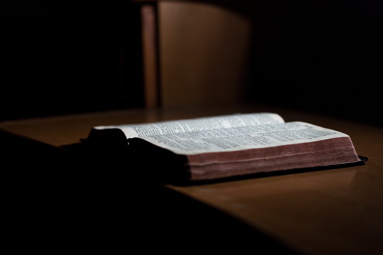 Open Bible on a wooden table