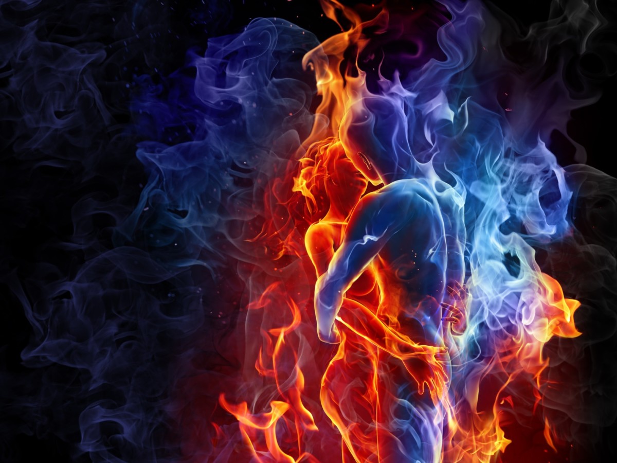 A man and woman with blue and red flame hugging each other