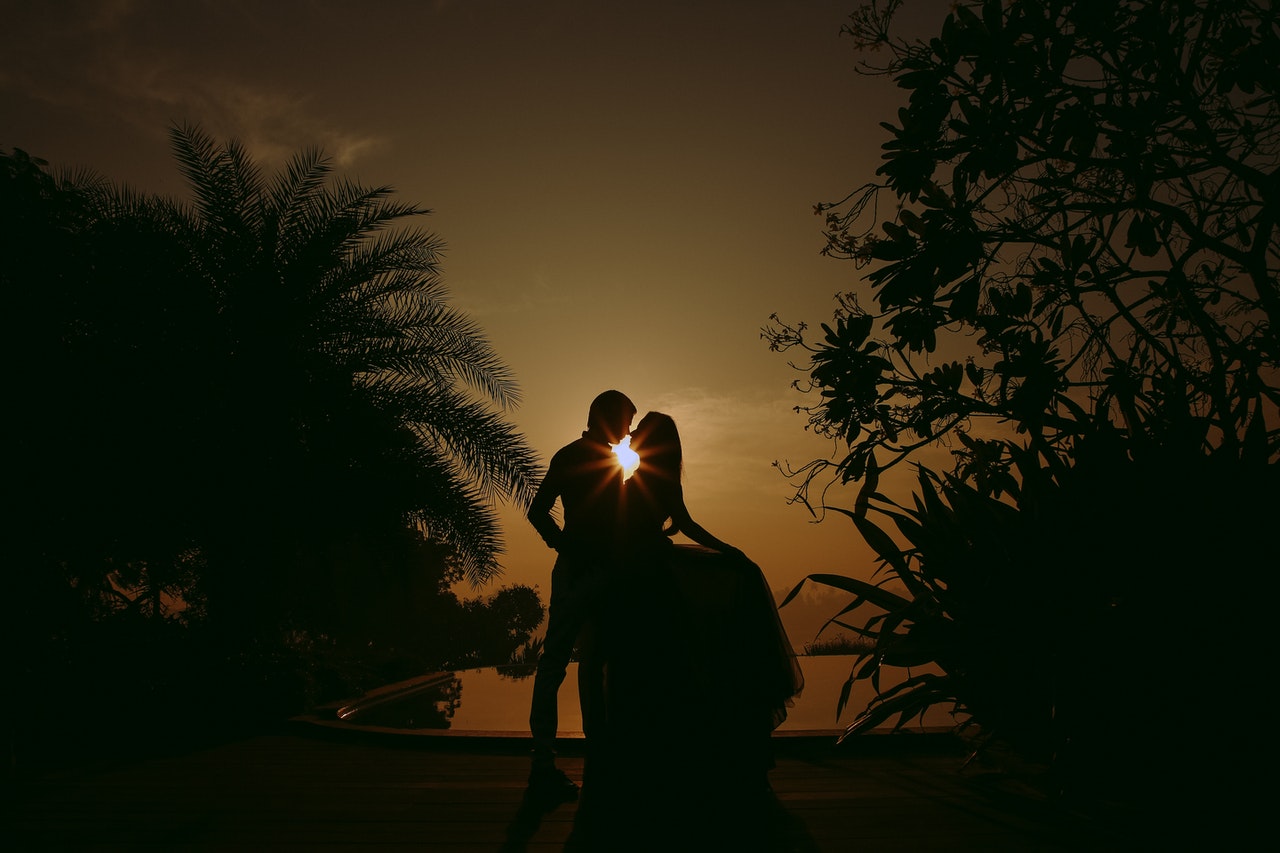 Silhouette of romantic couple at sunset