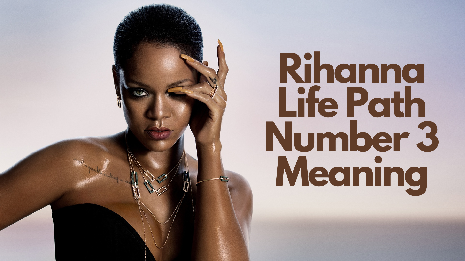 Rihanna wet look with her hand on her right eye and words Rihanna Life Path Number 3 Meaning