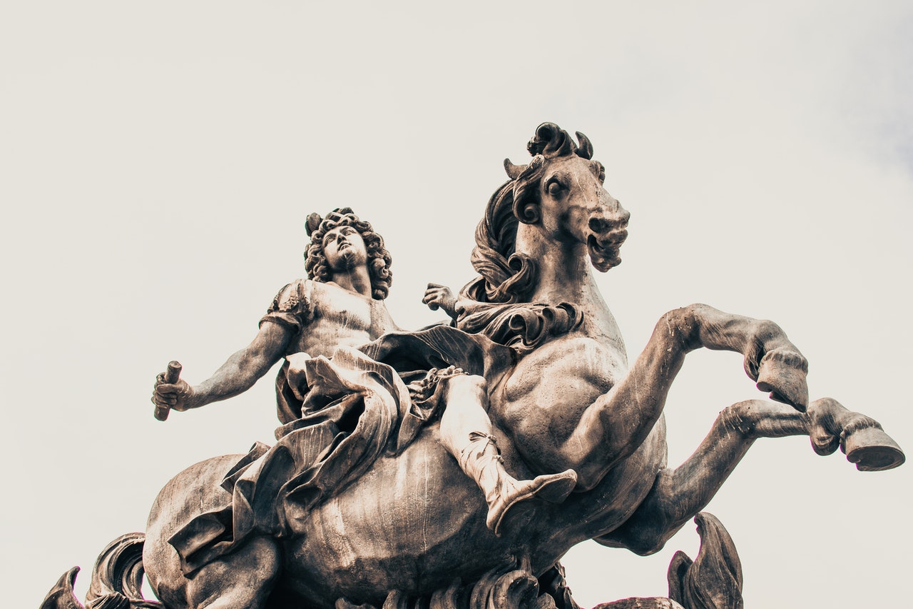 A Statue of a Woman Riding a Horse