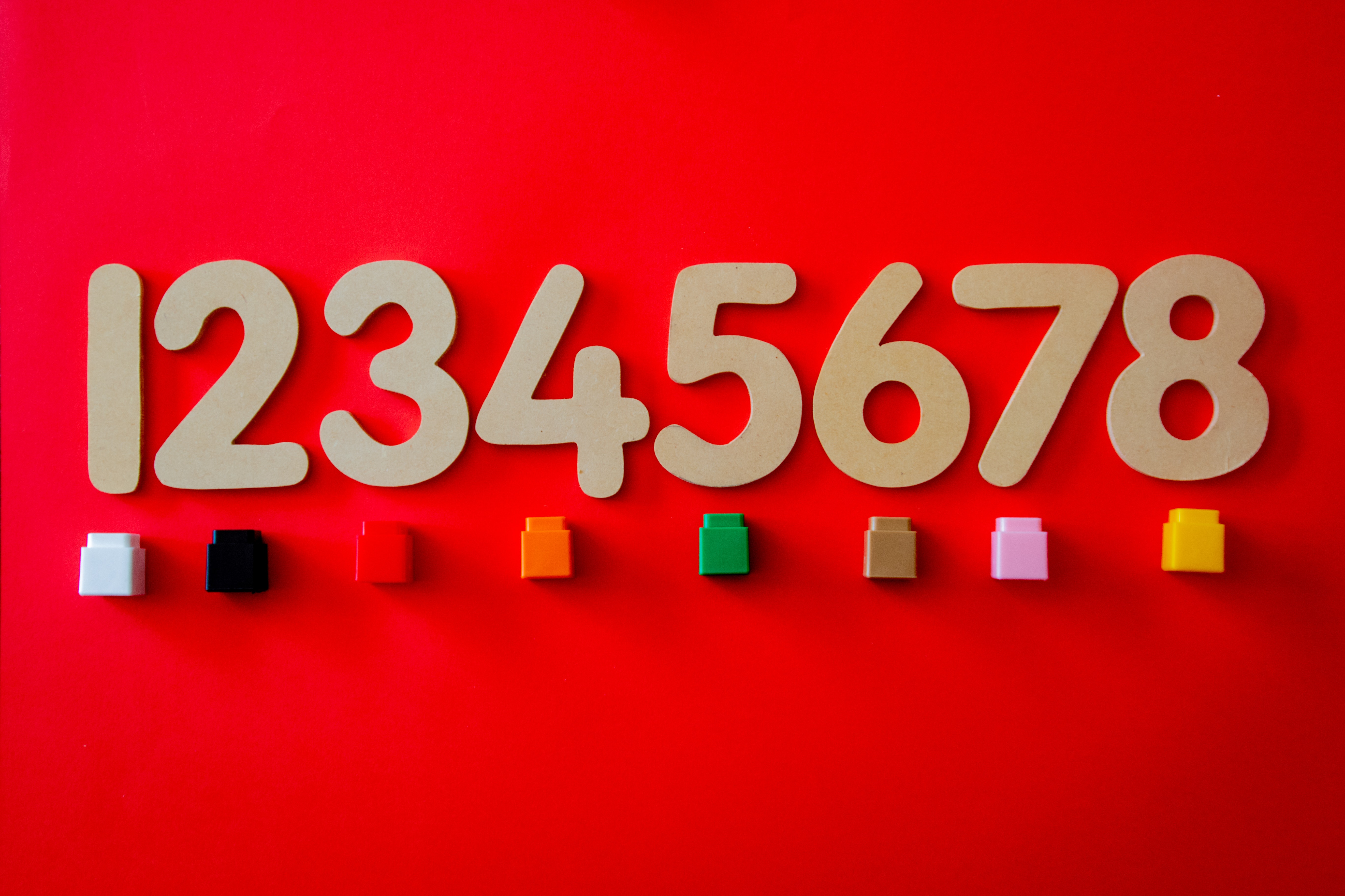 Legos in different colors under numbers 1 to 8