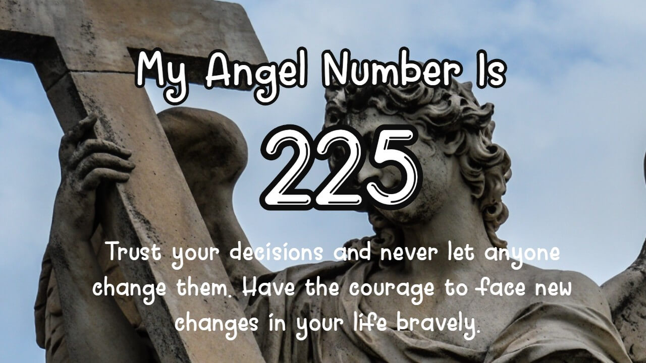 An angel statue holding a cross with words My angel number is 225