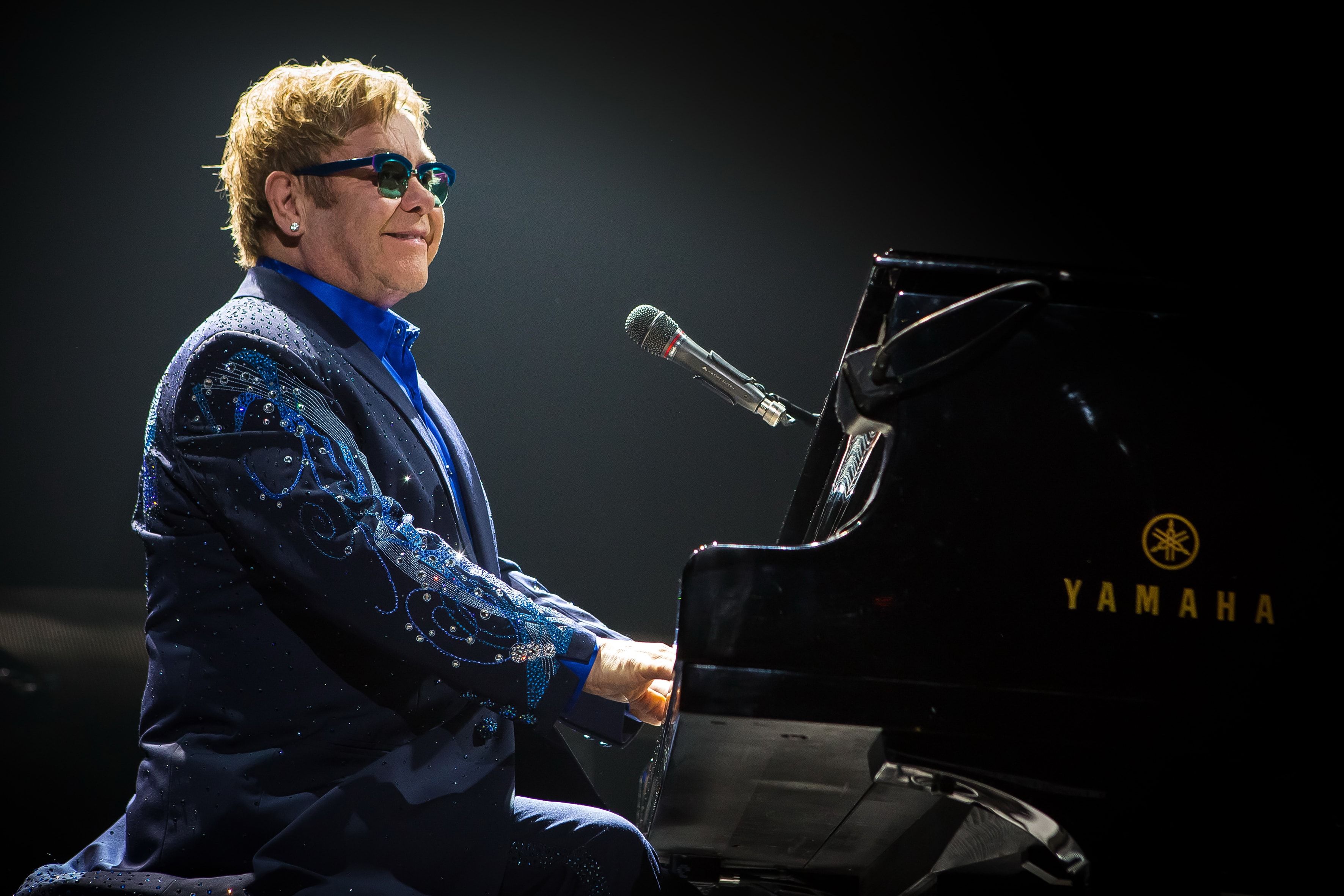 Elton John playing the piano