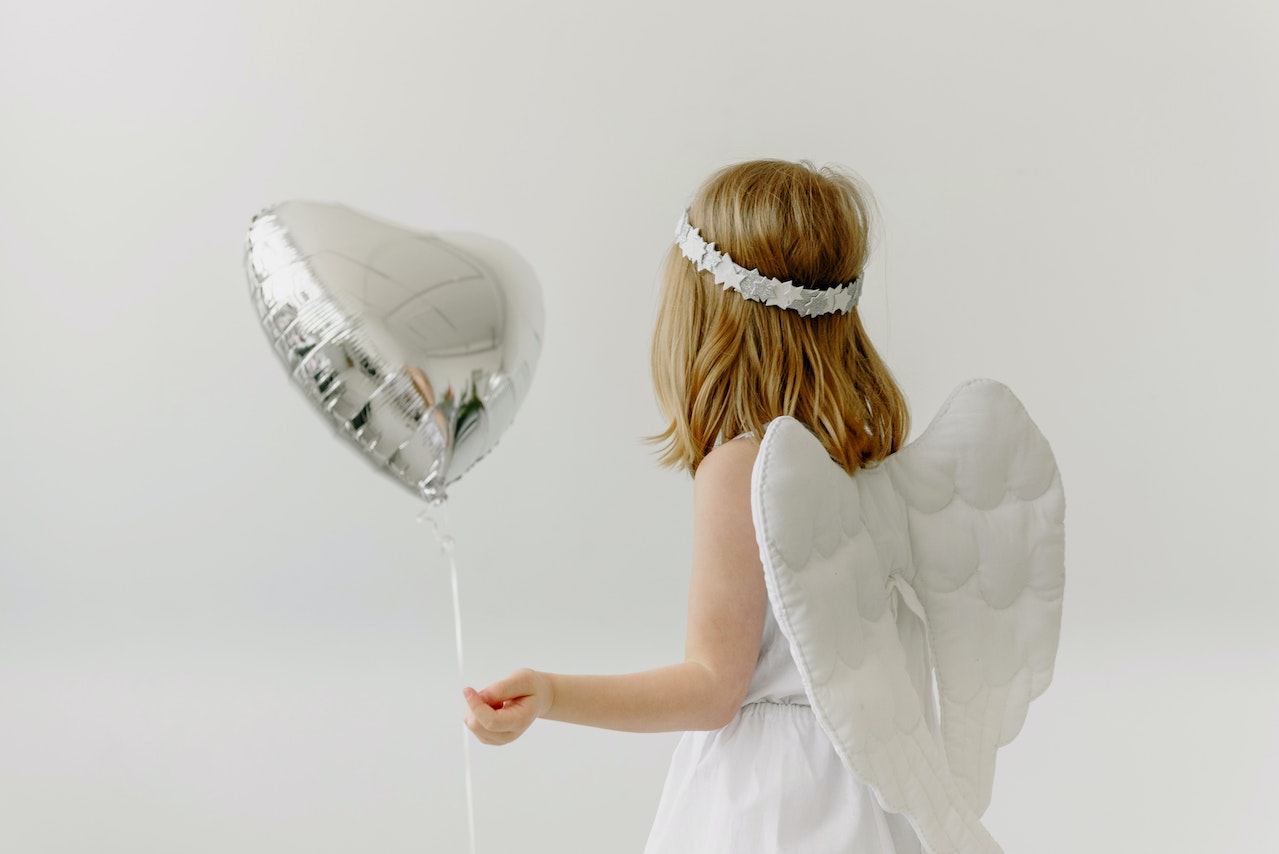 Girl In White Wings And White Dress