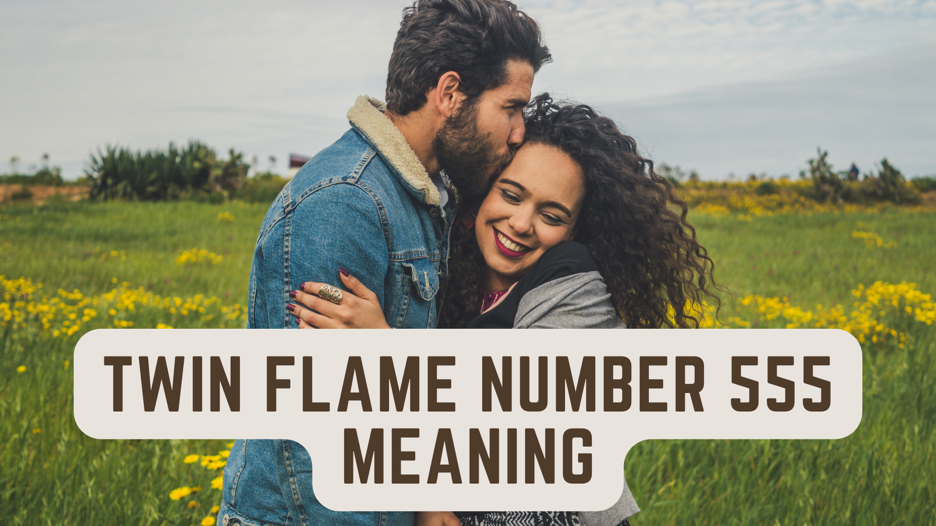 A couple hugging each other while in the field with words Twin Flame Number 555 Meaning