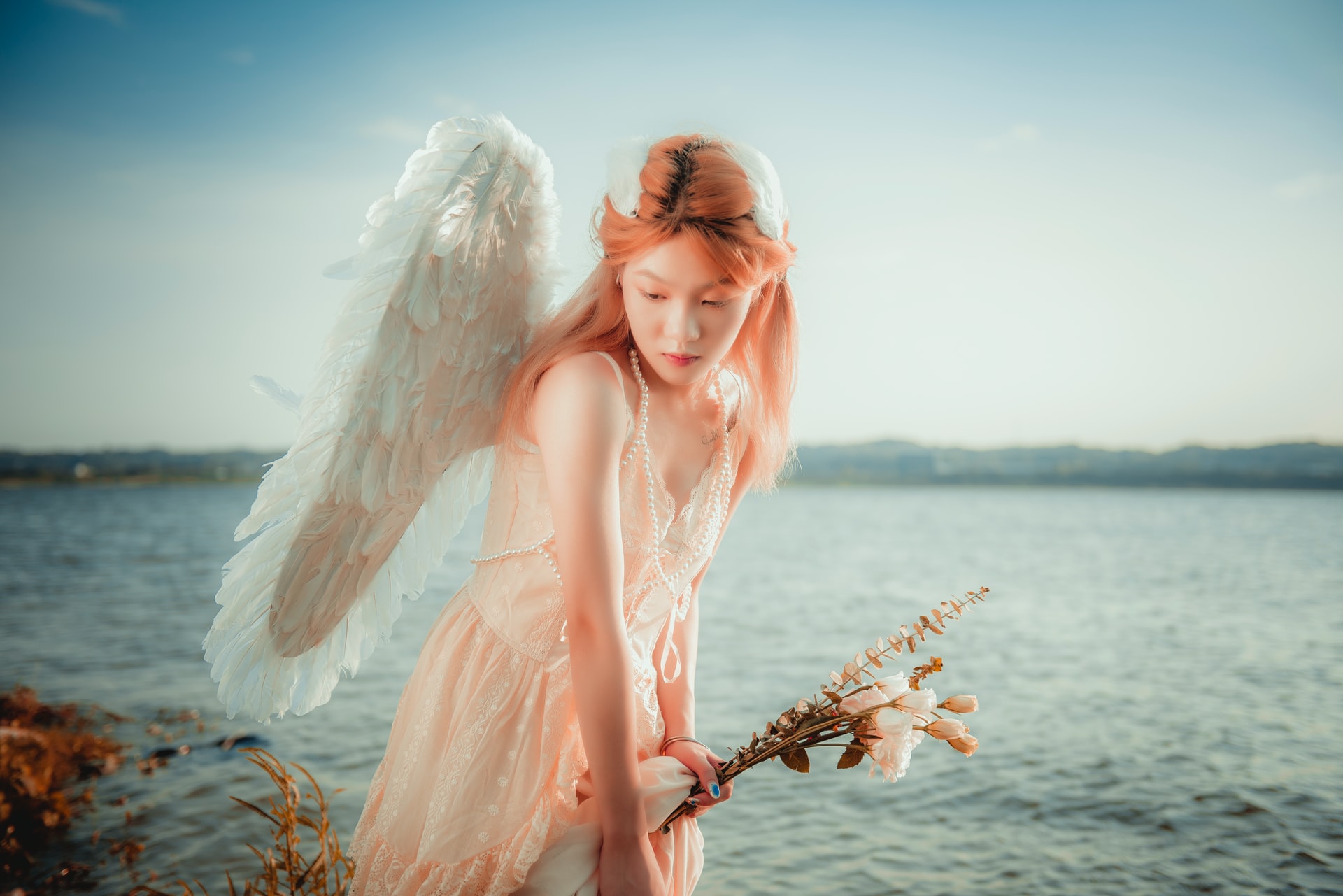 Girl Standing at River Bank With Angelic Wings