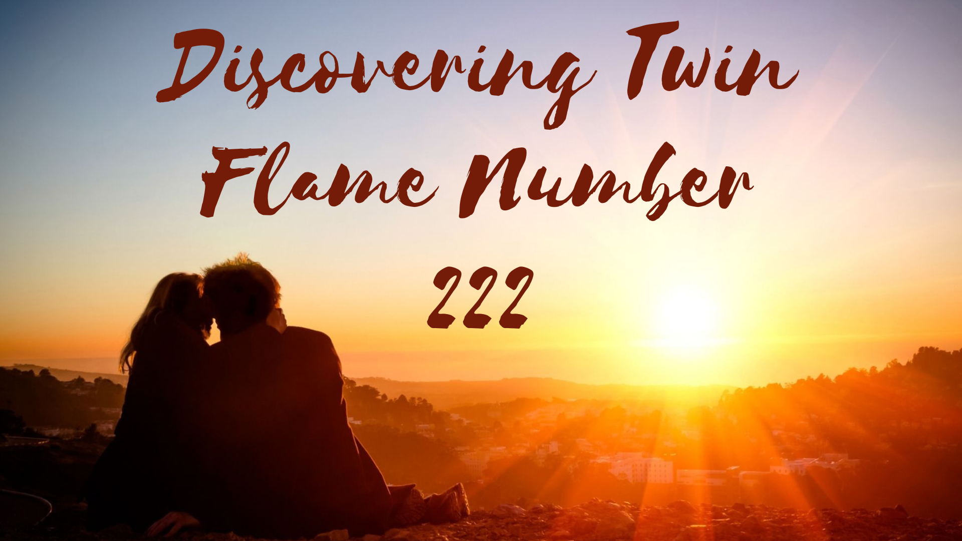 Couple sitting on the ground while looking at the sunset with words Discovering Twin Flame Number 222