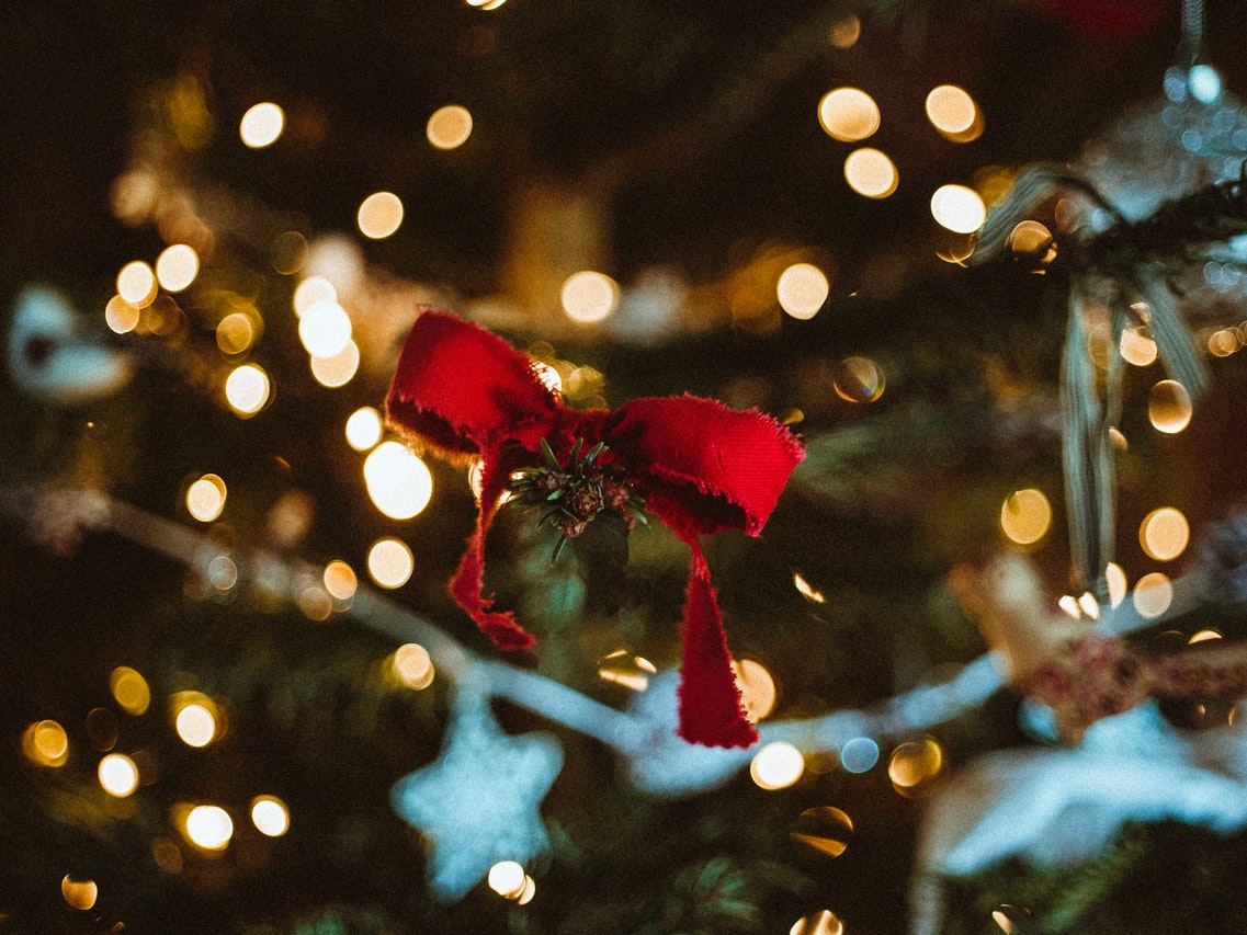 Red Ribbon On A Christmas Tree