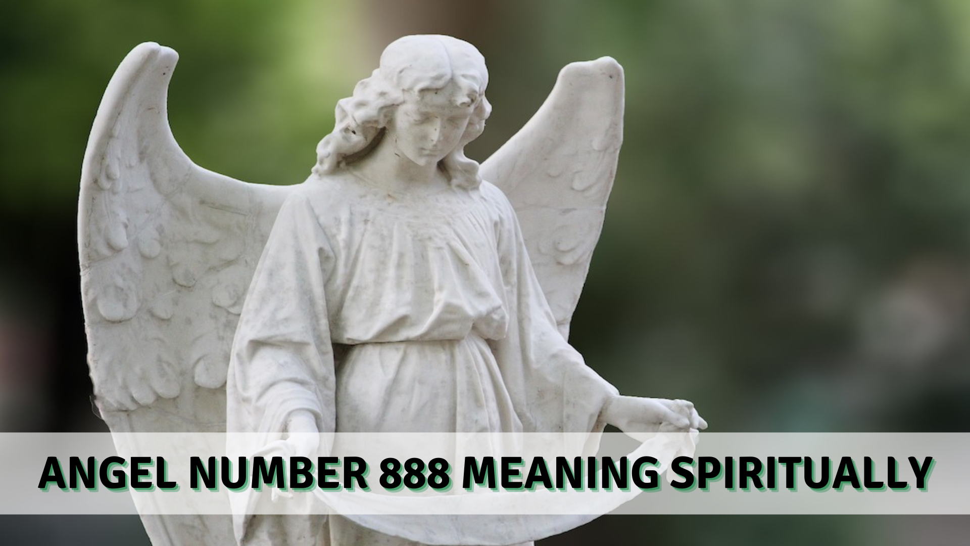 An angel statue with words Angel Number 888 Meaning Spiritually