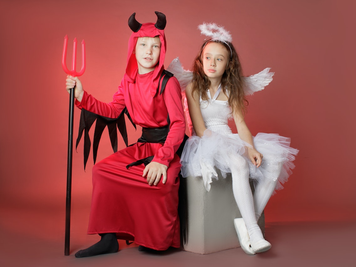 Two Kids in Halloween Costumes