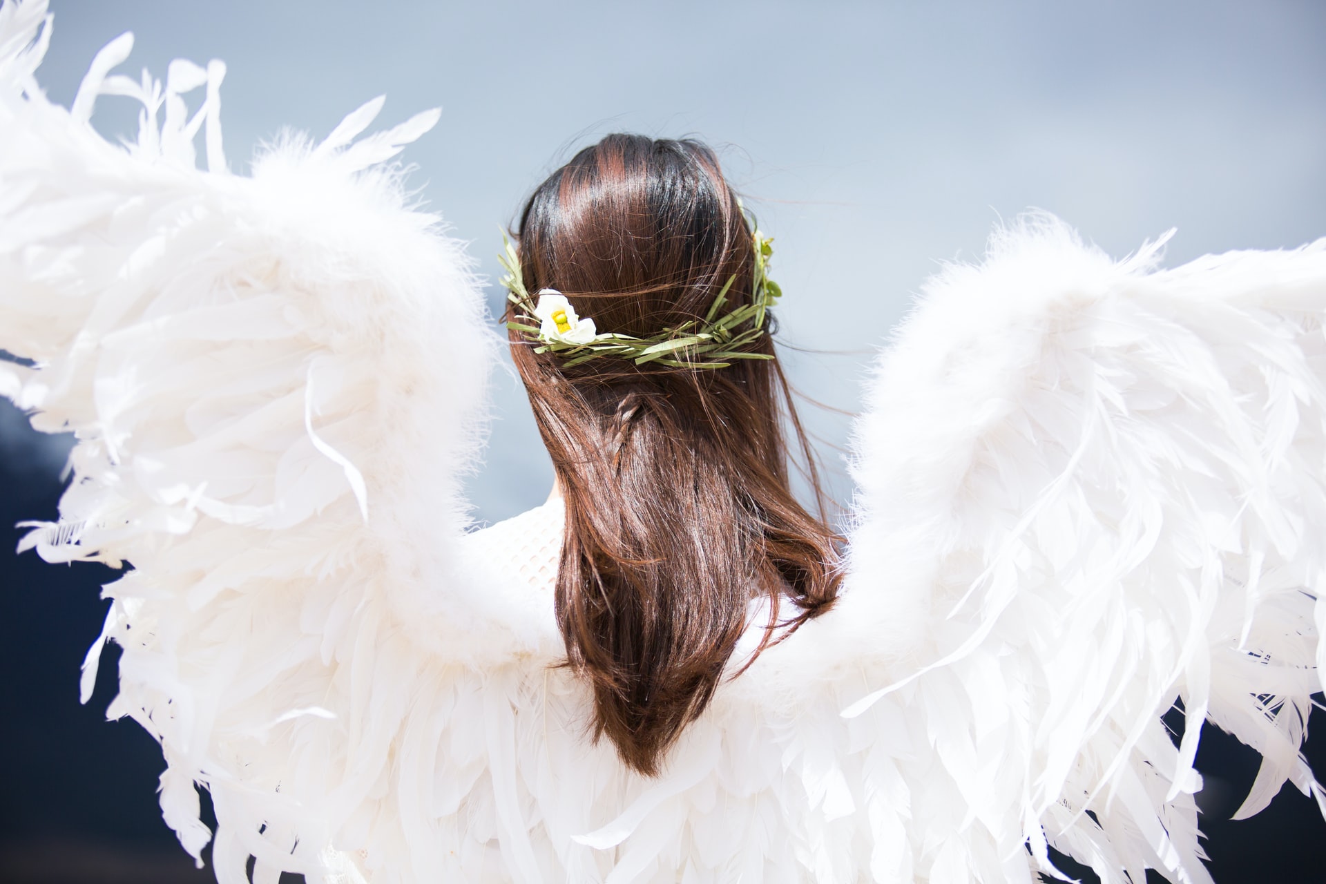 Woman Wearing White Angel Wings