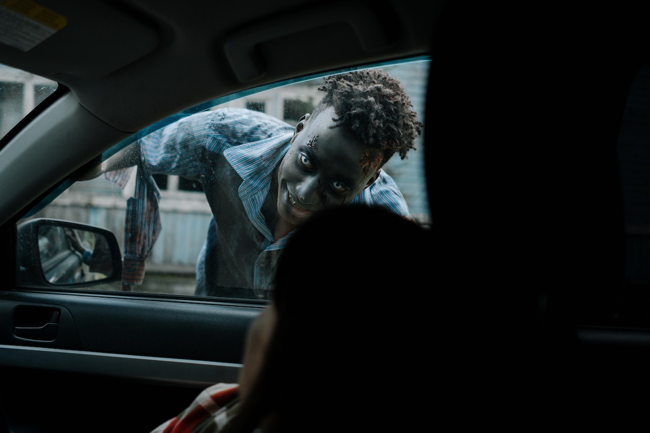 Zombie peeking through a car window