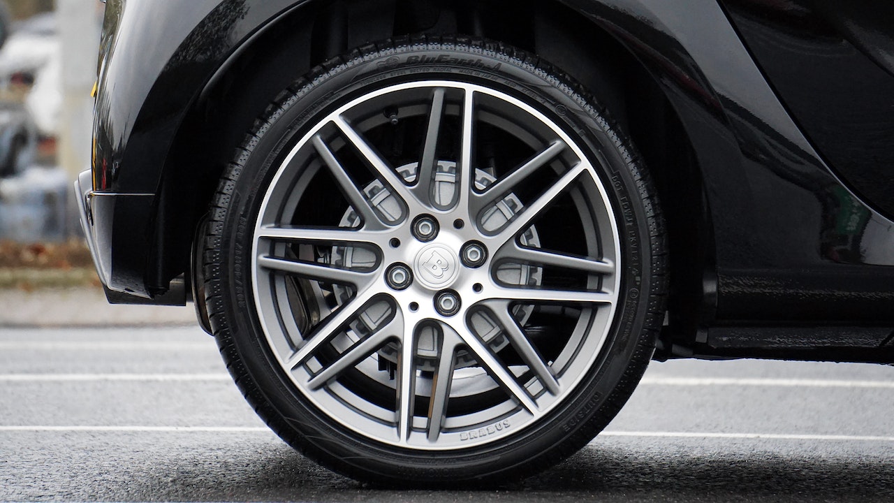 A black and silver tire of a car