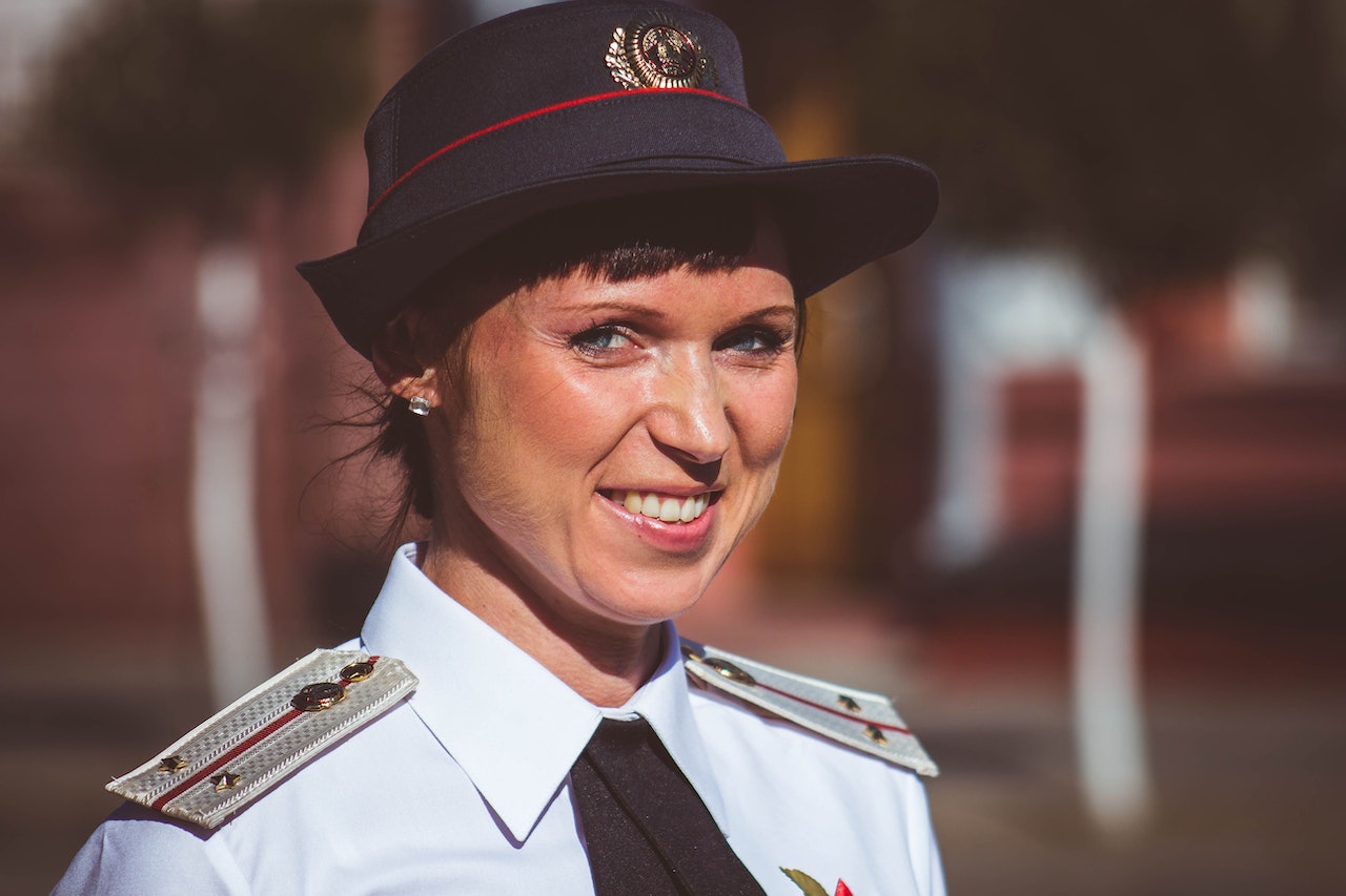 A policewoman smiling at the camera