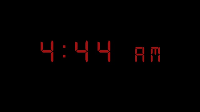 Digital clock showing 4:44 am