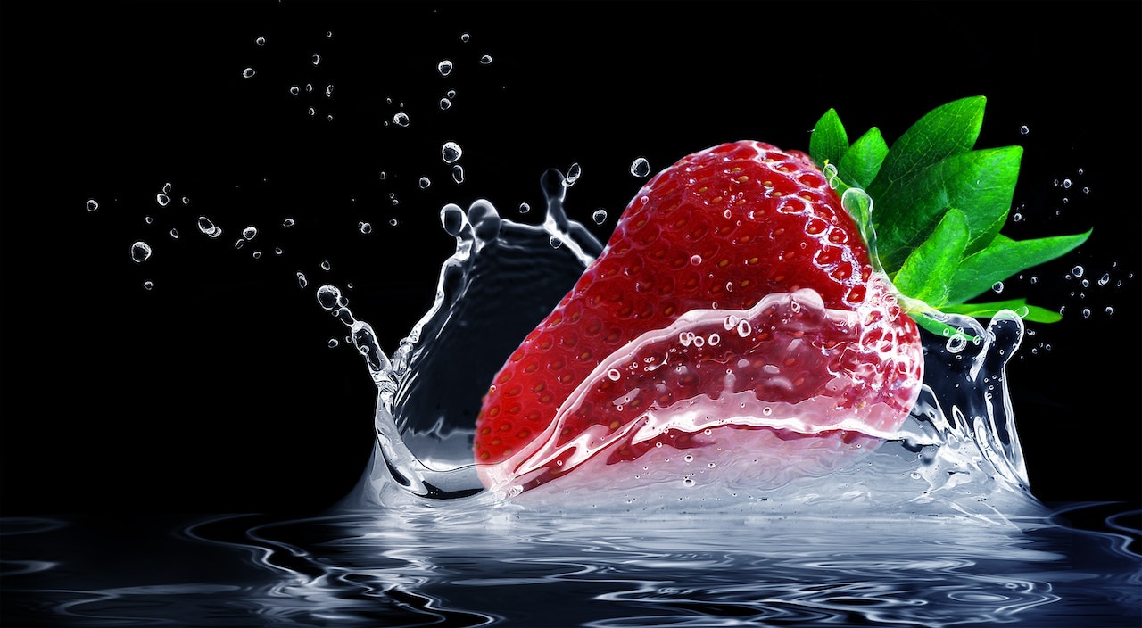 Straw Berry Fruit Drop on Water