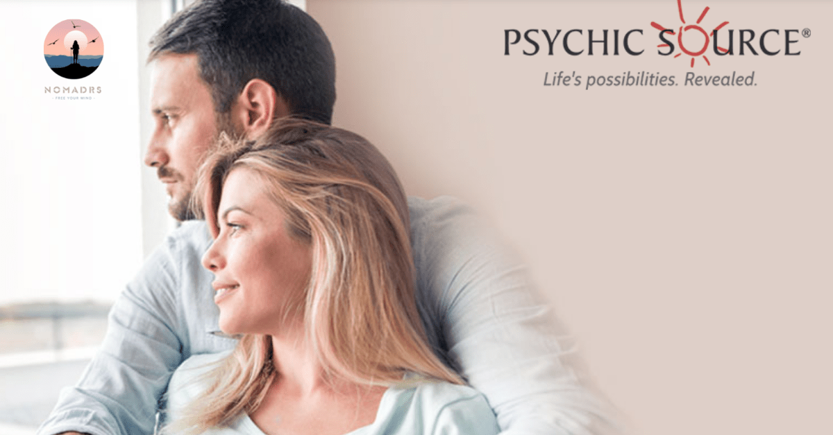 A couple hugging each other looking at the window with psychic source logo on the right side