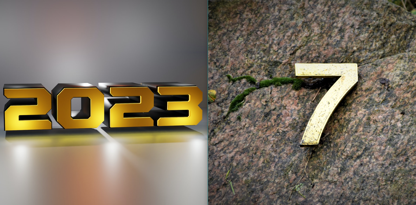The year ‘2023’ illuminated and in gold; the number ‘7’ lying down on a rough surface of a rock
