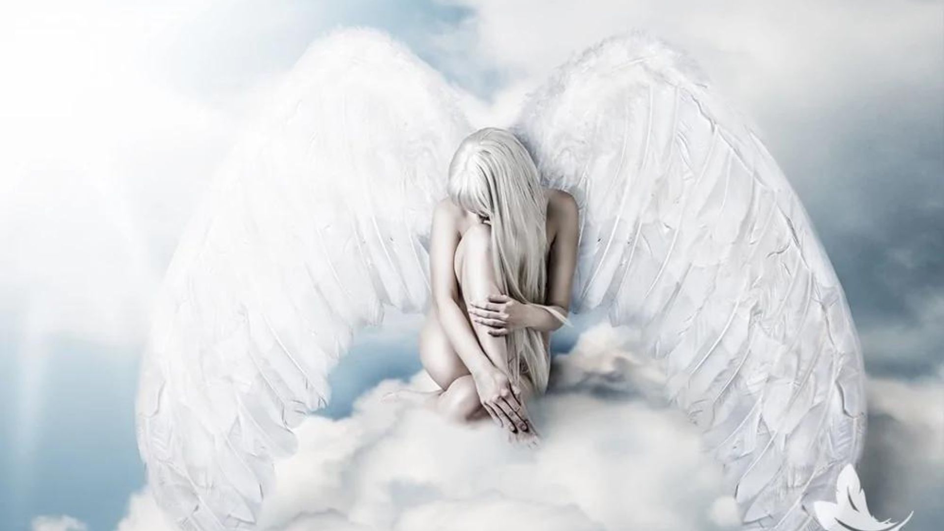 An Angel Sitting On A Cloud