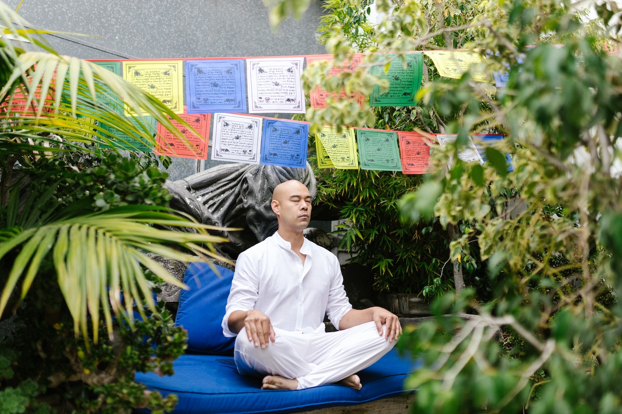 A Man Meditating in the Garden