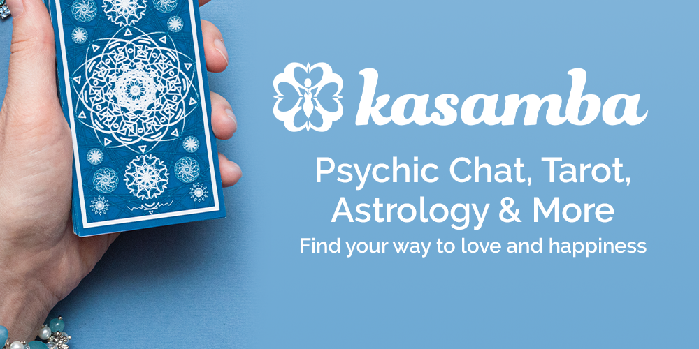 A person holding a blue psychic card with kasamba logo on the right side