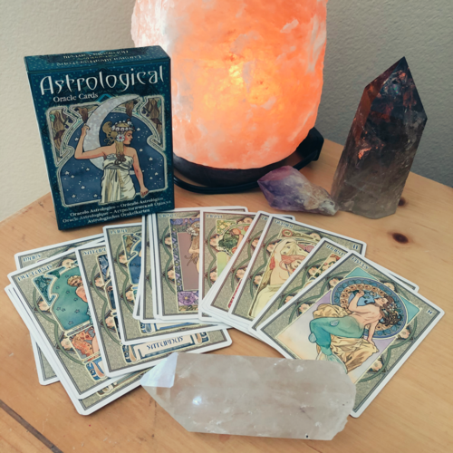Different astrological cards and crystals in different colors