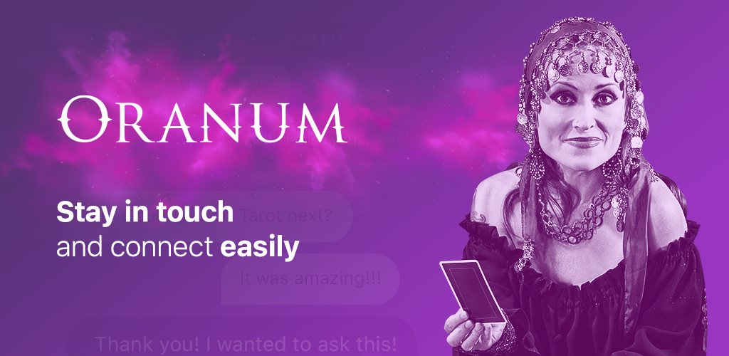 A smiling psychic holding a card with oranum logo on the left side