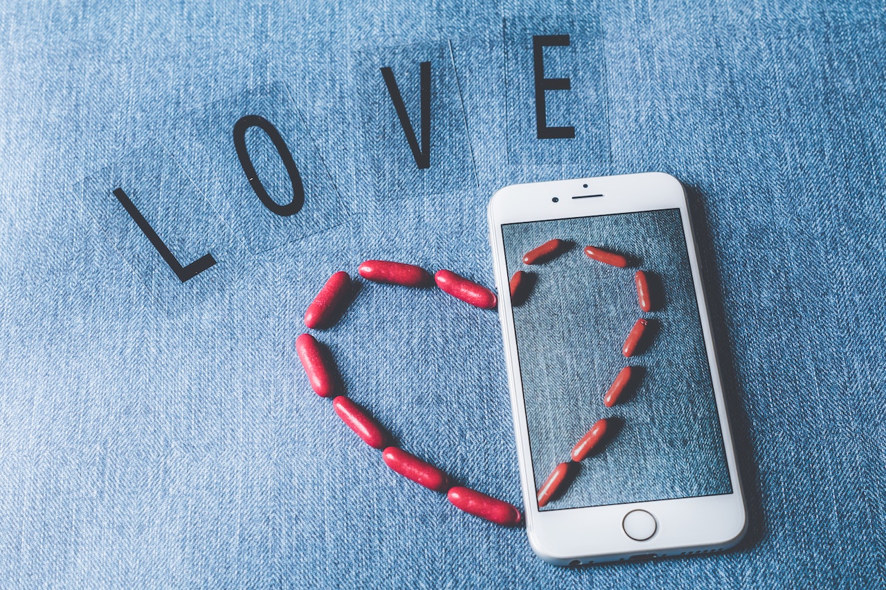 Silver Iphone 6 Beside Love Freestanding Letters
