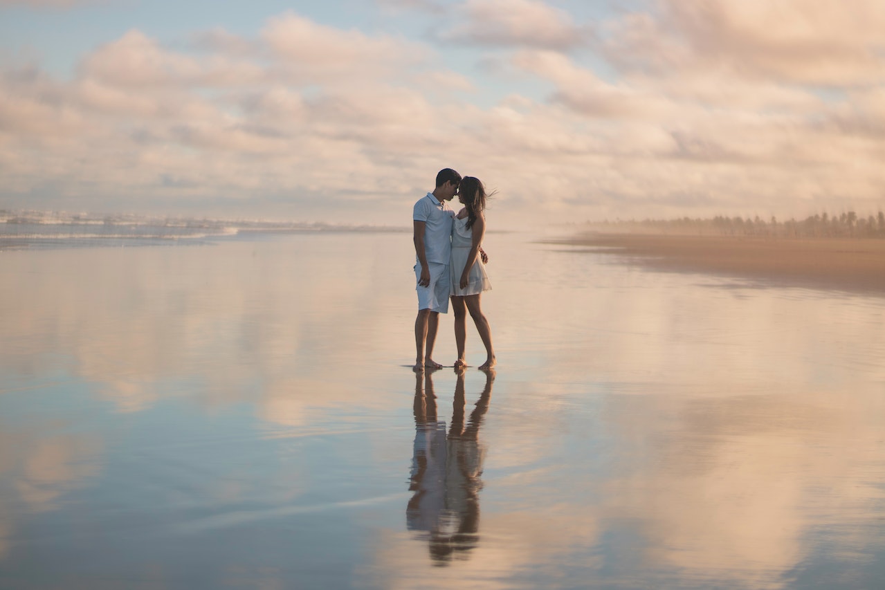 Couple Standing On Water