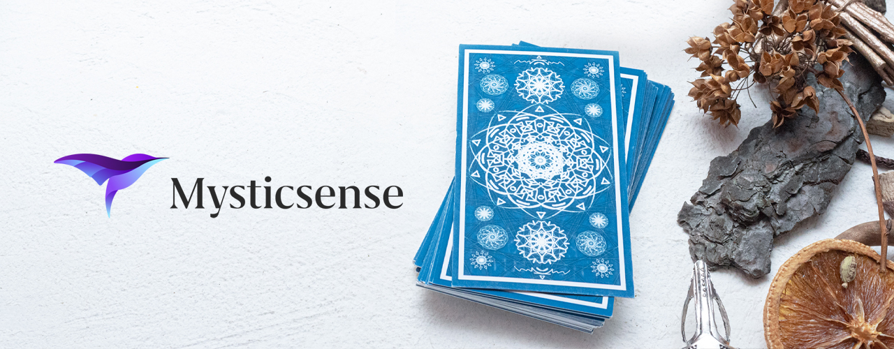 Blue tarot cards and ornaments with Mysticsense logo