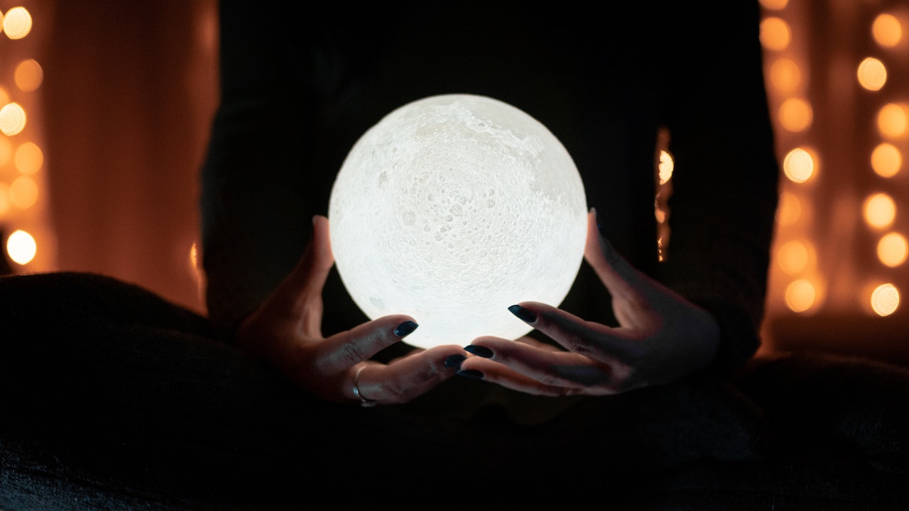 Fortune teller holding a crytal ball
