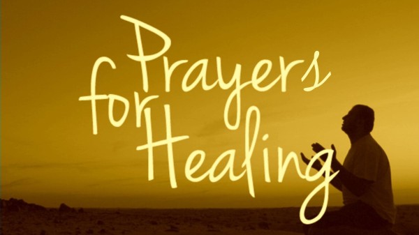 A man praying with prayers for healing wordings