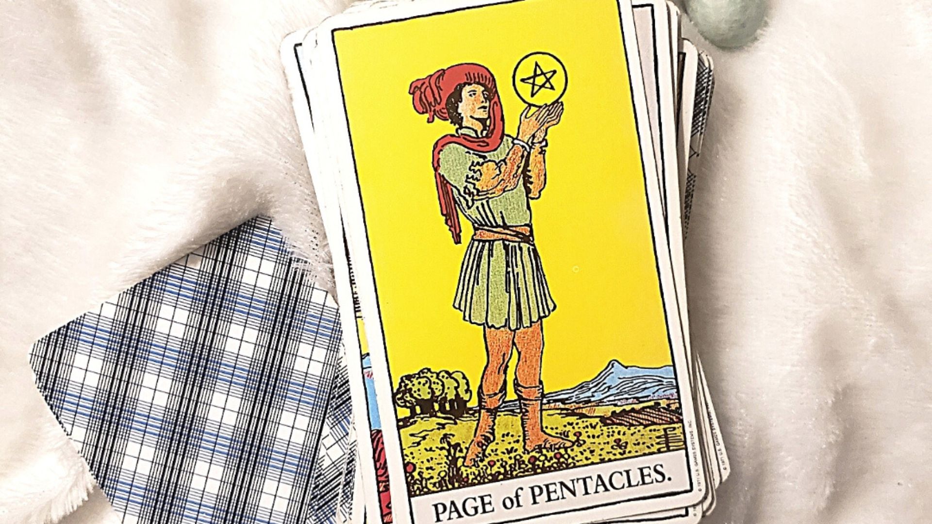 A Pentacles Card With Other Cards