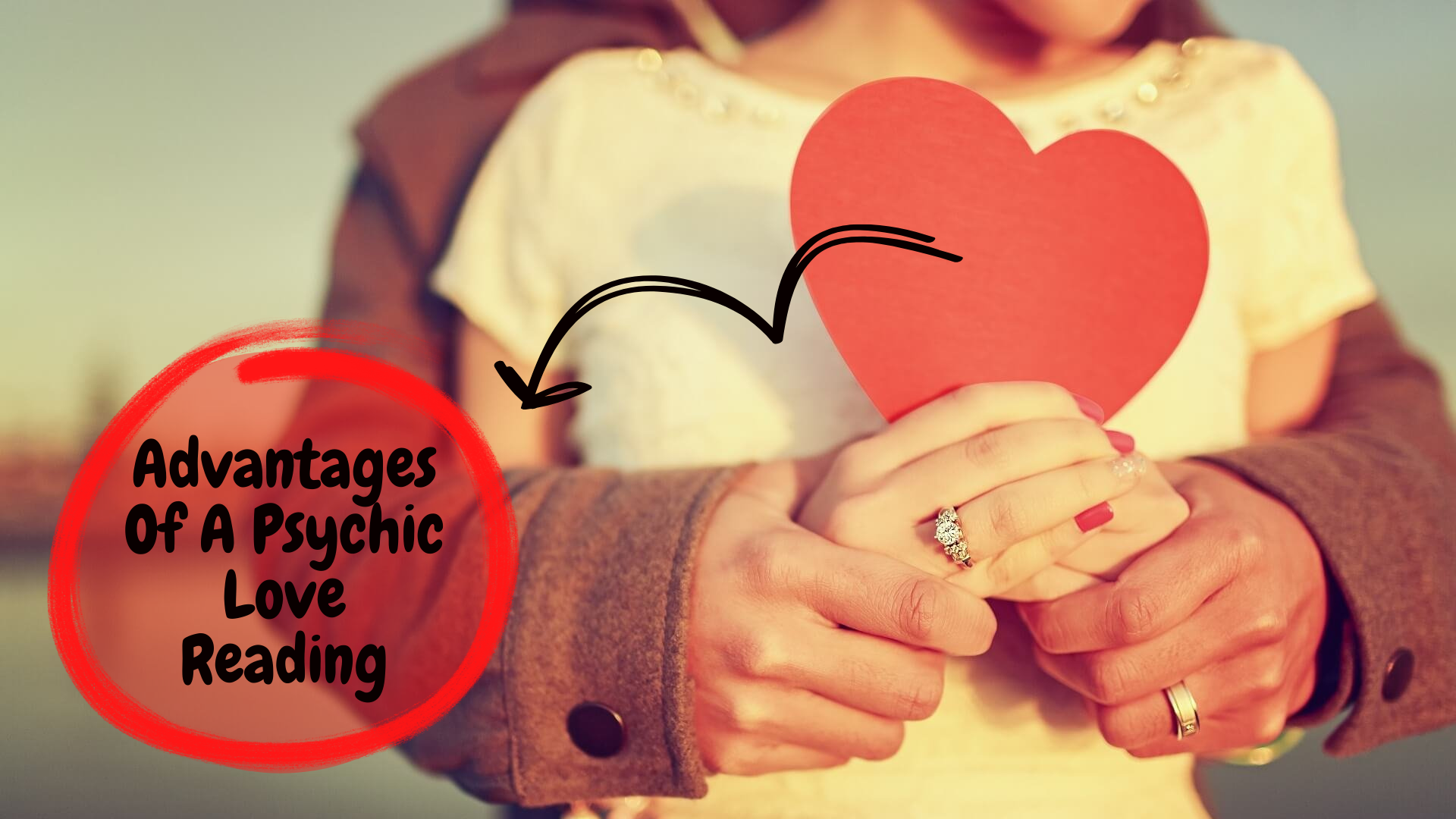 A couple holding each other hands with a heart paper and words Advantages of Psychic Love Reading