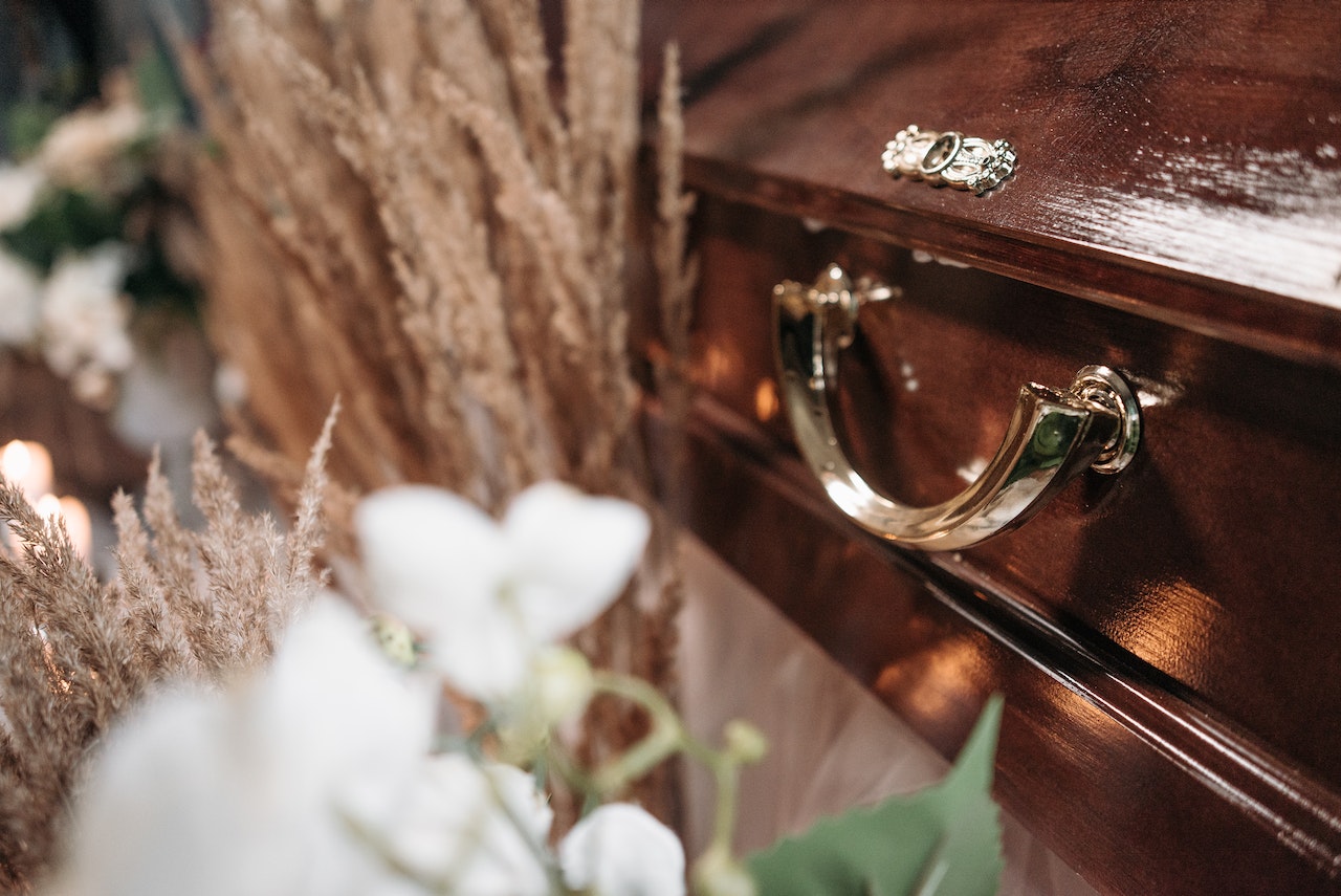 Close Up Shot of a Brown Wooden Coffin