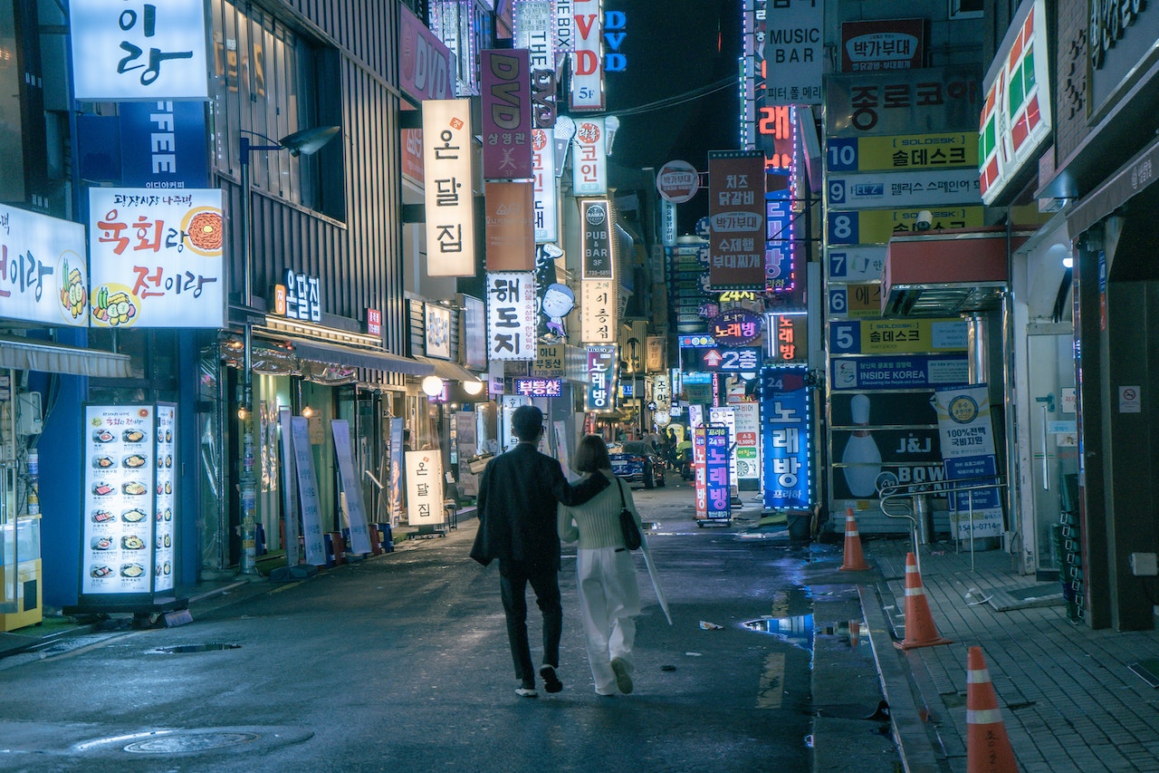 Couple Walking Together on the Street
