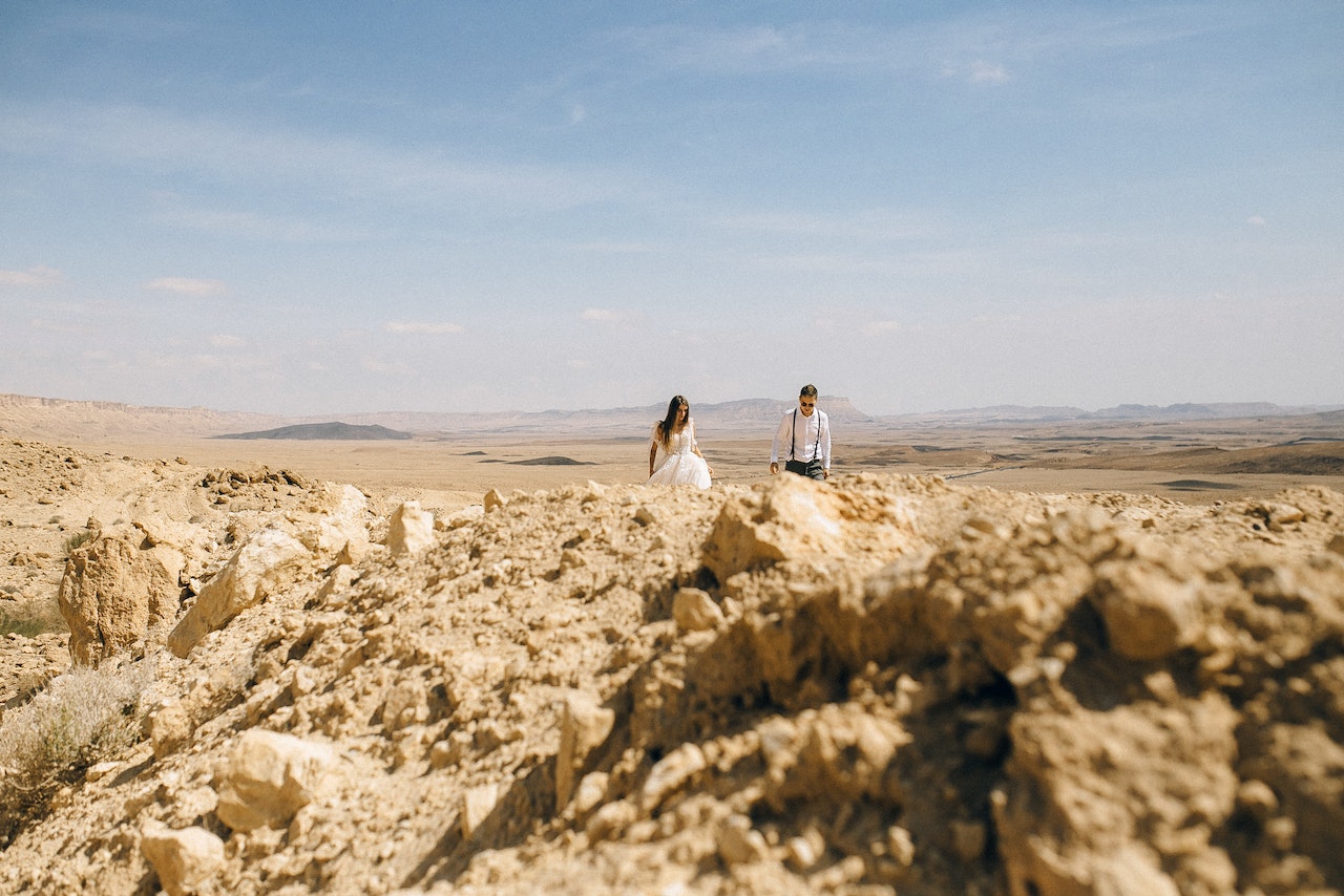 Couple Walking on the Desert
