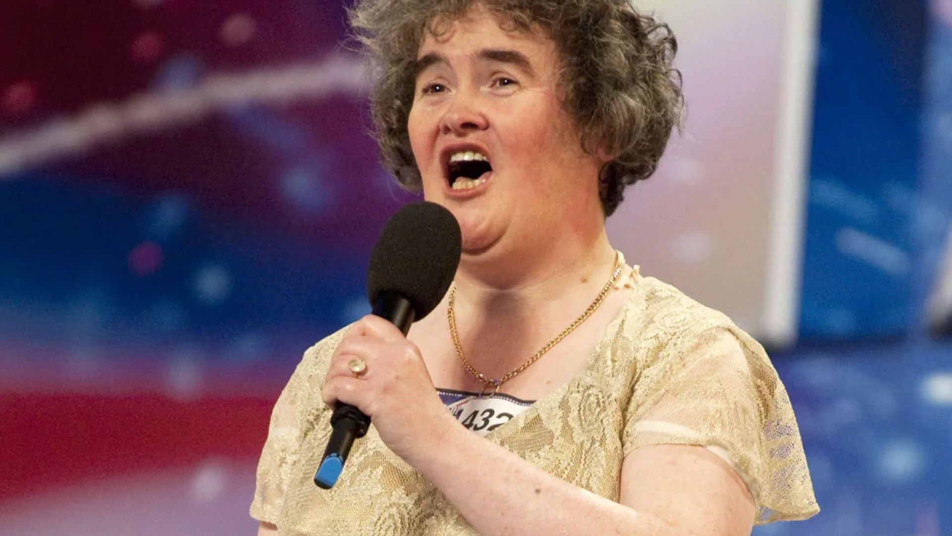 Susan Boyle  Holding A Mic And Singing A Song