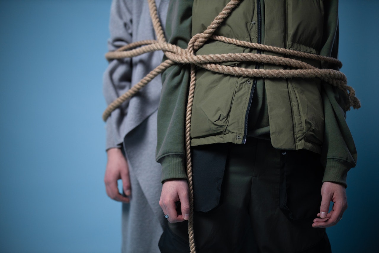Men Tied with Brown Rope