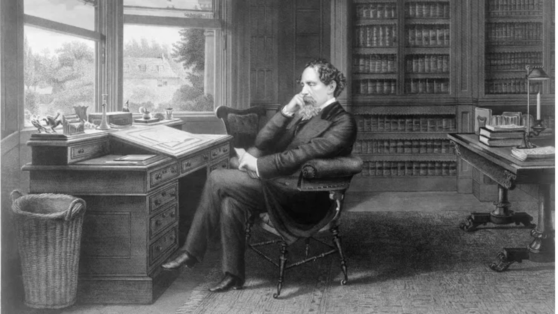 Charles Dickens Sitting On A Chair