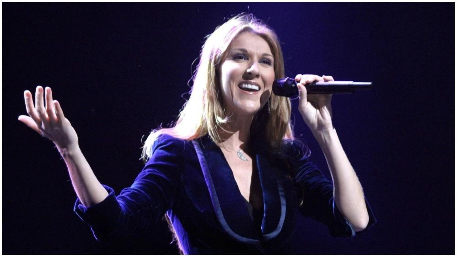 Celine Dion Singing And Wearing Blue Dreass